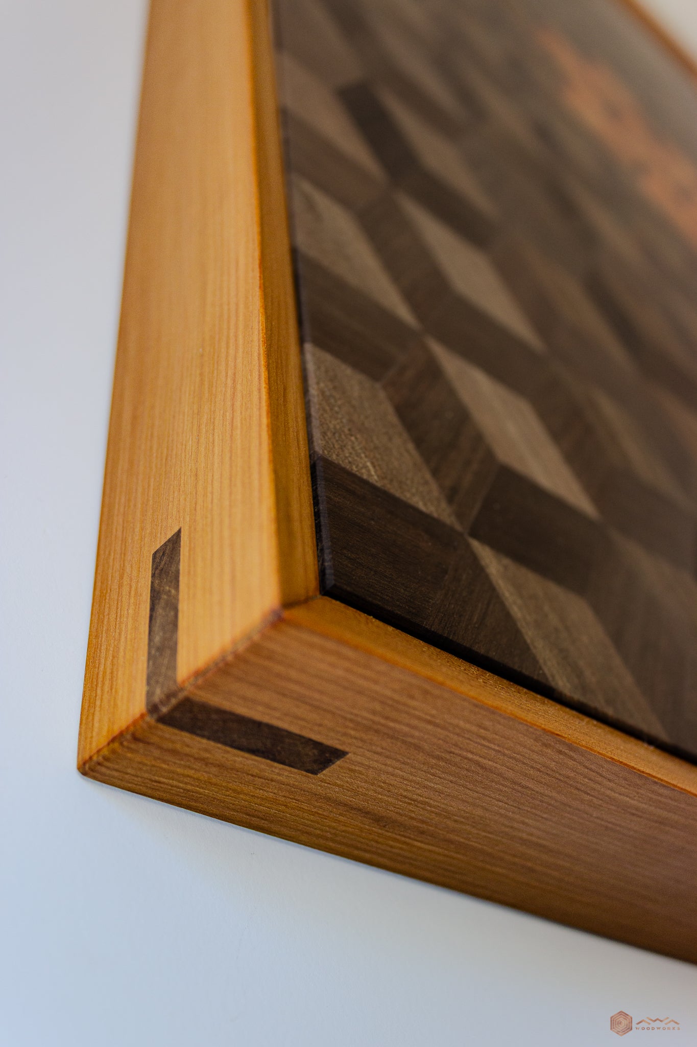 Corner detail showing raised panel and joinery on Rima sculptural wall piece